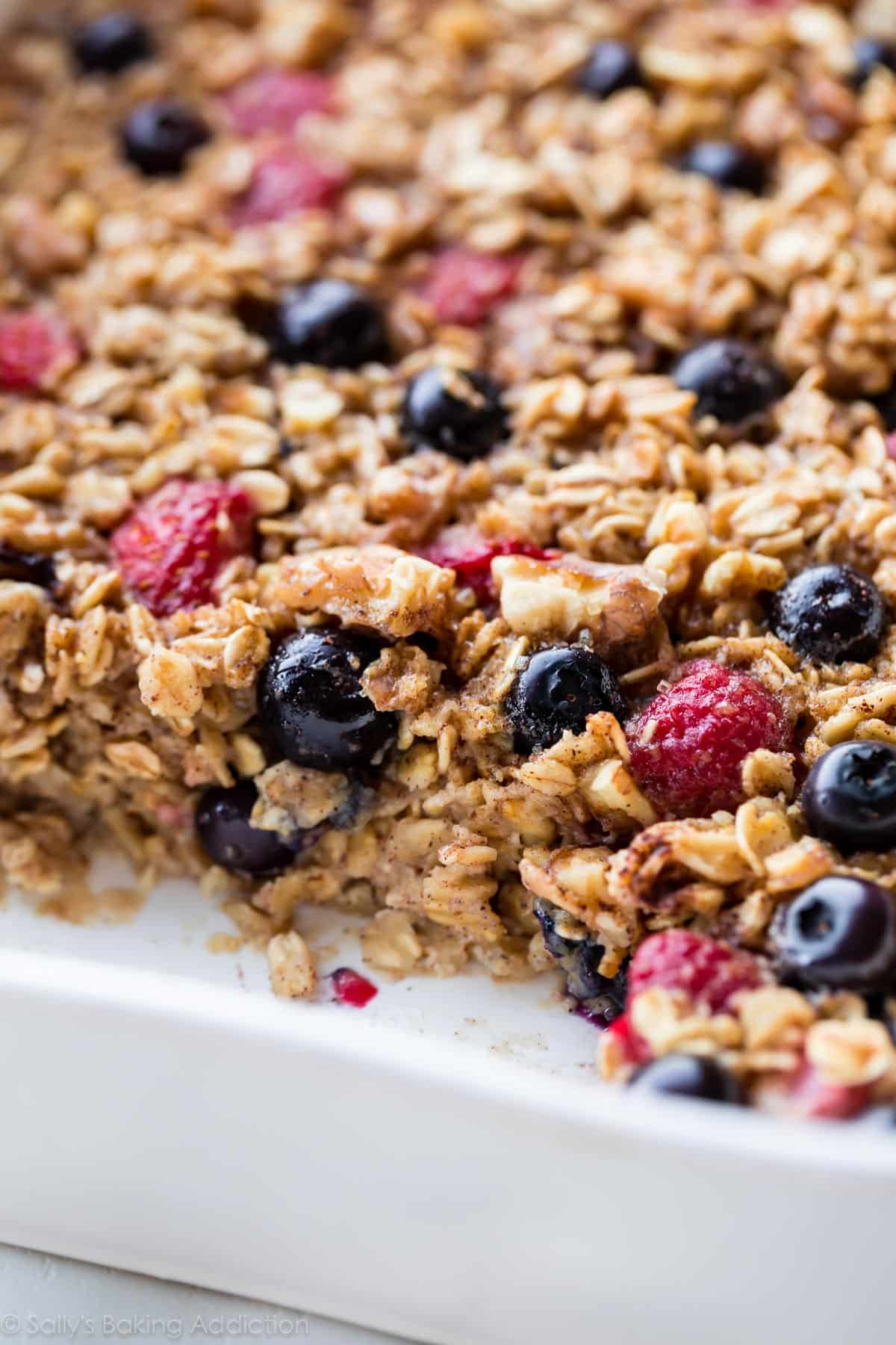 close up image of healthy baked oatmeal in baking dish