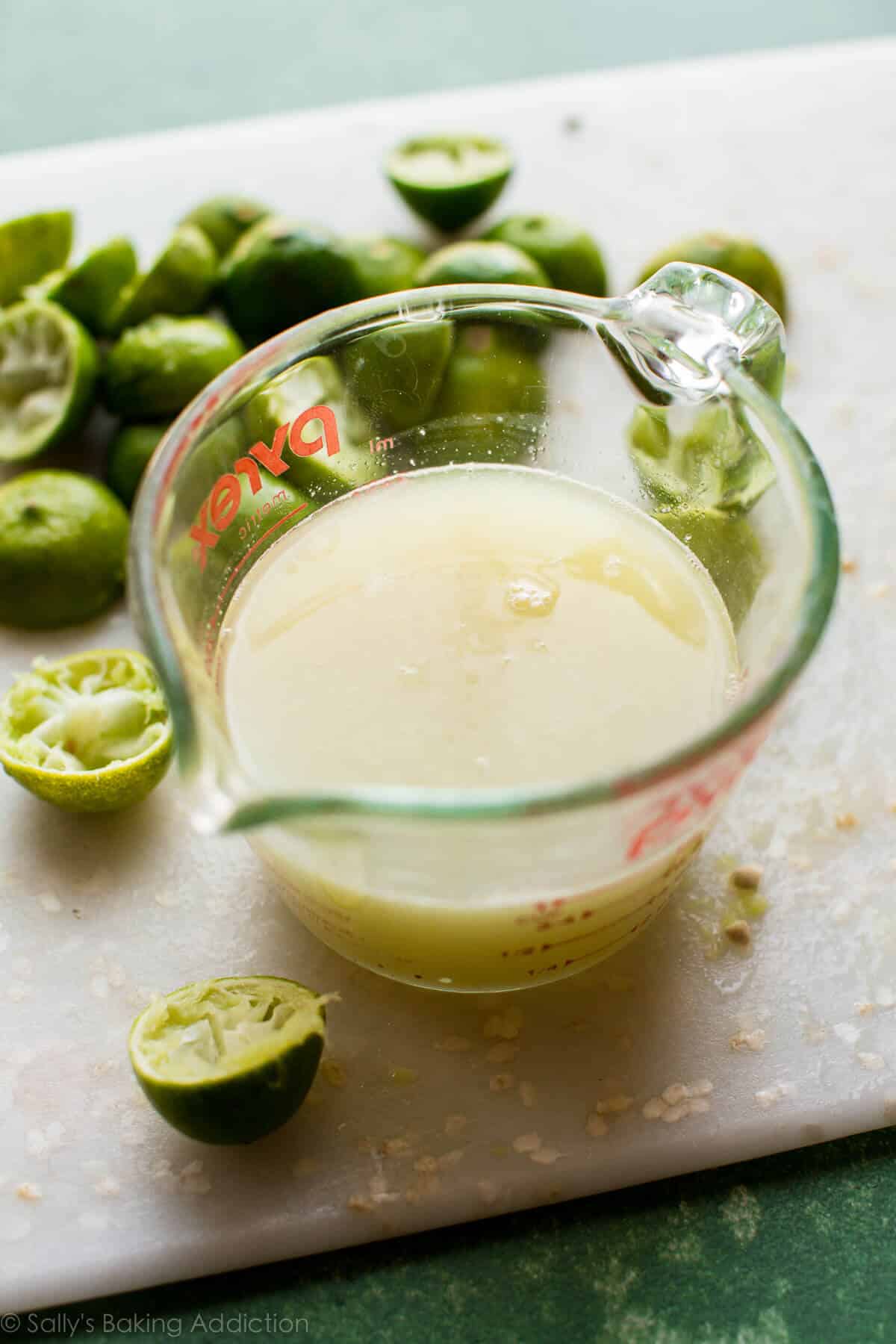 key lime juice in a glass measuring cup