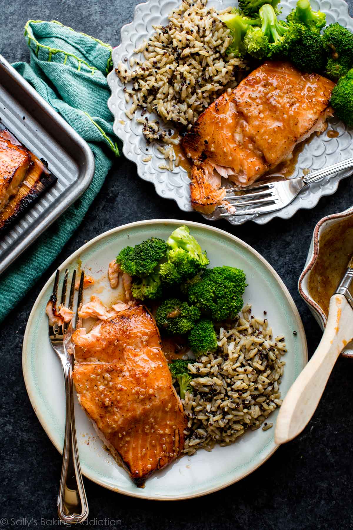overhead image of plates with honey chipotle salmon, broccoli, and rice