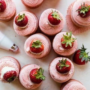 overhead image of white chocolate strawberry cupcakes