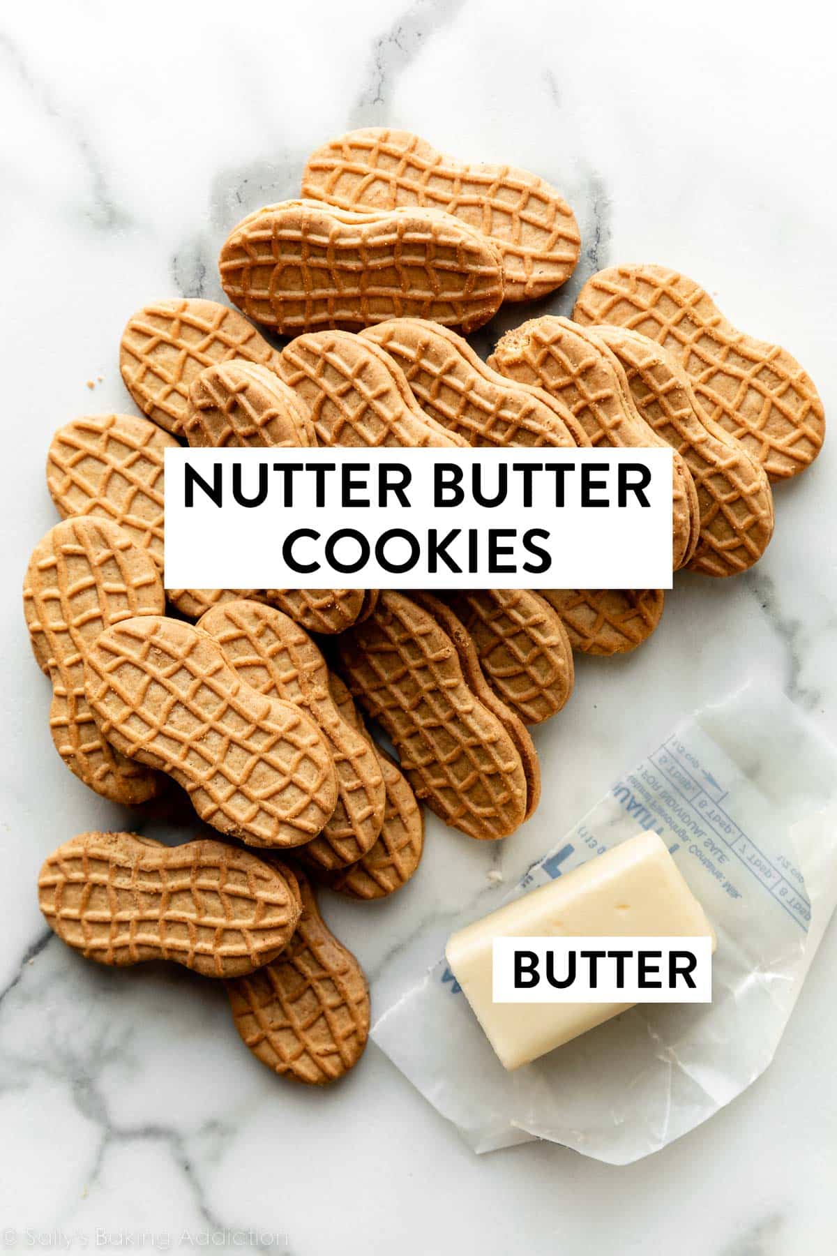 Nutter Butter sandwich cookies and butter on marble counter.